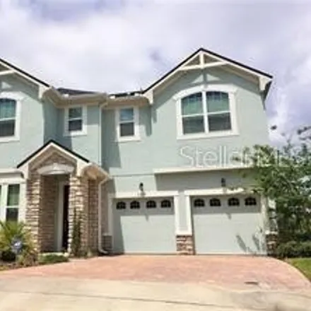 Buy this 5 bed house on 5397 Dove Tree Street in Orlando, FL 32811