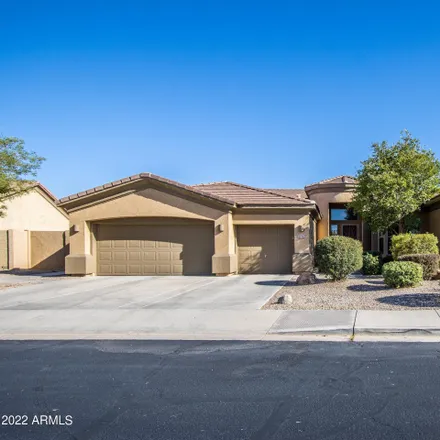 Buy this 4 bed house on 17747 West Wind Song Avenue in Goodyear, AZ 85338
