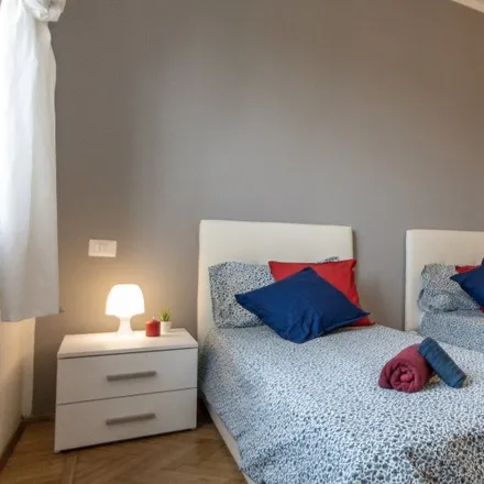 Rent this 4 bed room on Via Giuseppe Massarenti in 20148 Milan MI, Italy