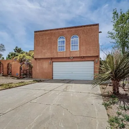 Buy this 4 bed house on 7248 Christy Avenue Northeast in Albuquerque, NM 87109