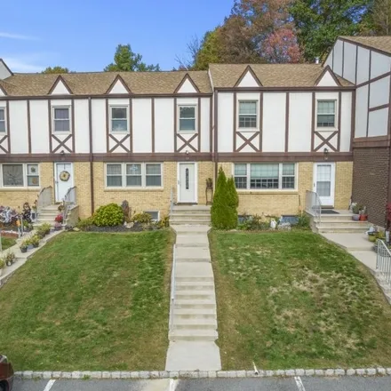 Buy this 2 bed townhouse on 71 Tudor Place in Mount Olive, NJ 07828
