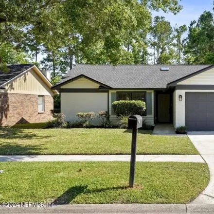 Buy this 4 bed house on 1608 Shearwater Drive in Jacksonville, FL 32218