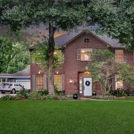 Rent this 4 bed house on 7707 Heathrow Ln in Spring, Texas