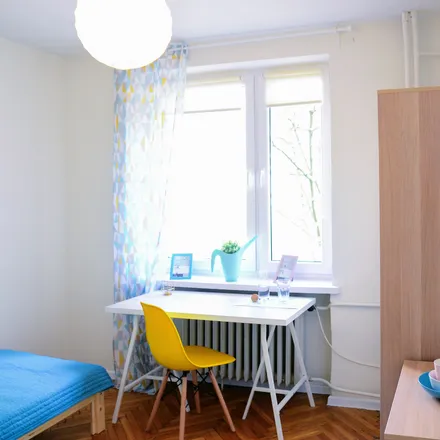 Rent this 4 bed room on Hoża 36 in 00-516 Warsaw, Poland