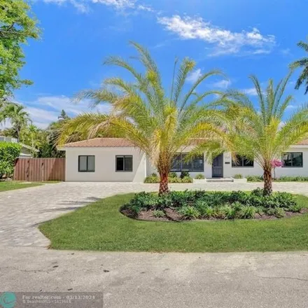 Buy this 4 bed house on 2573 Northeast 22nd Street in Soroka Shores, Fort Lauderdale