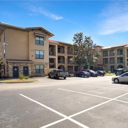 Rent this 3 bed condo on Charo Parkway in Polk County, FL 33897