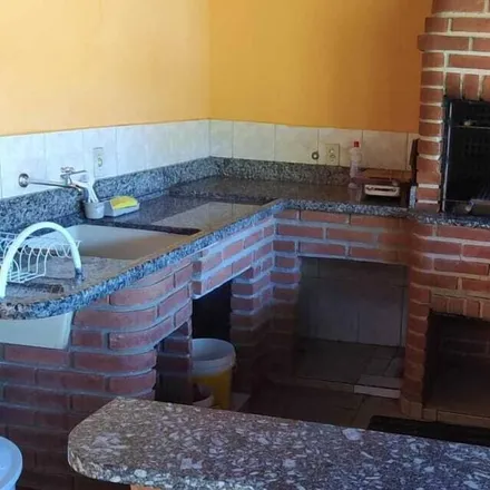 Rent this 4 bed house on Região Geográfica Intermediária de Campinas - SP in 13960-000, Brazil