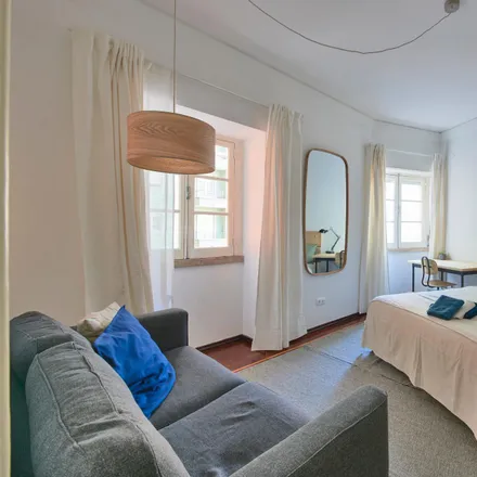 Rent this 4 bed room on Praça Olegário Mariano 6 in 1170-278 Lisbon, Portugal