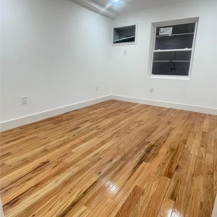 Rent this 3 bed apartment on 72-11 Hillmeyer Avenue in New York, NY 11692