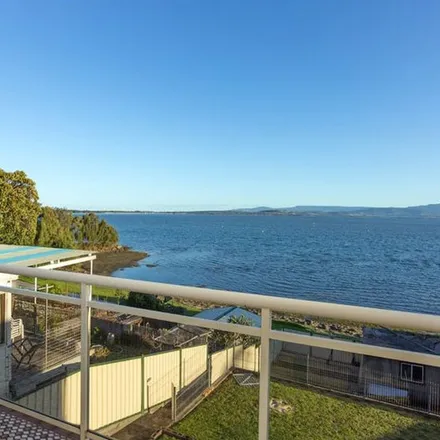 Rent this 4 bed apartment on Northcliffe Drive in Lake Heights NSW 2502, Australia