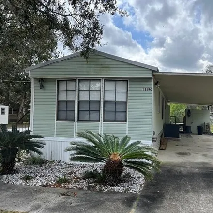 Buy this studio apartment on 11254 Northwest 114 Street in Levy County, FL 32626