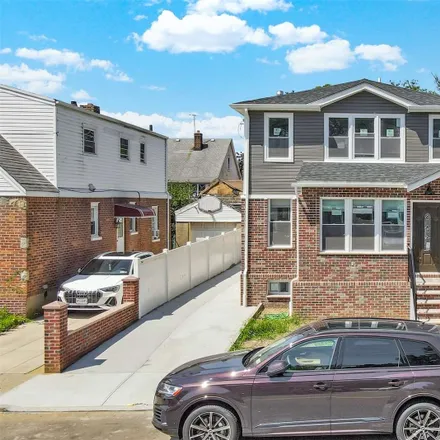 Buy this 6 bed townhouse on 141-16 185th Street in New York, NY 11413