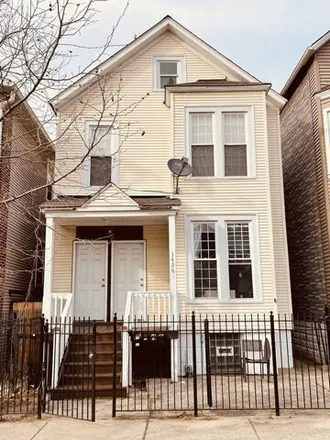 Buy this 6 bed house on 3426 West McLean Avenue in Chicago, IL 60647
