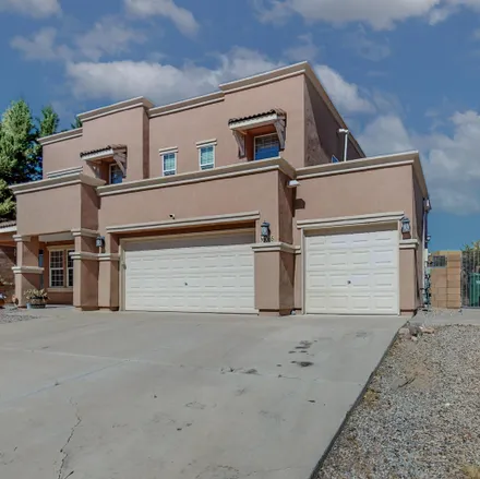 Buy this 4 bed loft on 6055 Crownpoint Drive Northeast in Rio Rancho, NM 87144