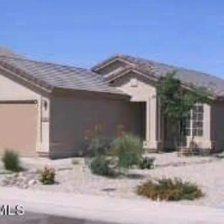 Rent this 3 bed house on 953 East Desert Holly Drive in San Tan Valley, AZ 85143