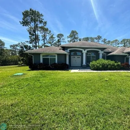 Buy this 4 bed house on 14518 79th Court North in Palm Beach County, FL 33470