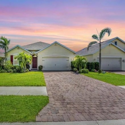 Rent this 4 bed house on 3446 Acapulco Circle in Porto Vista, Cape Coral