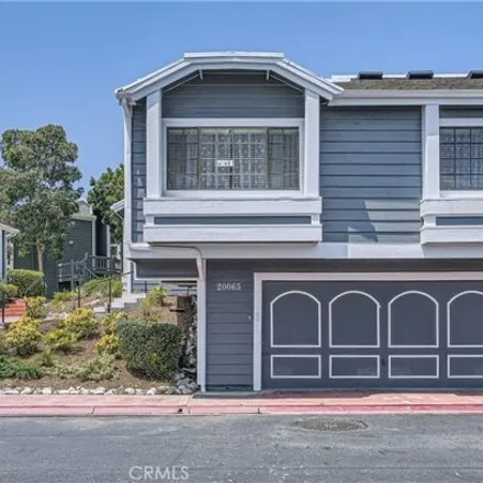 Buy this 3 bed townhouse on 20061 Waterford Lane in Huntington Beach, CA 92646