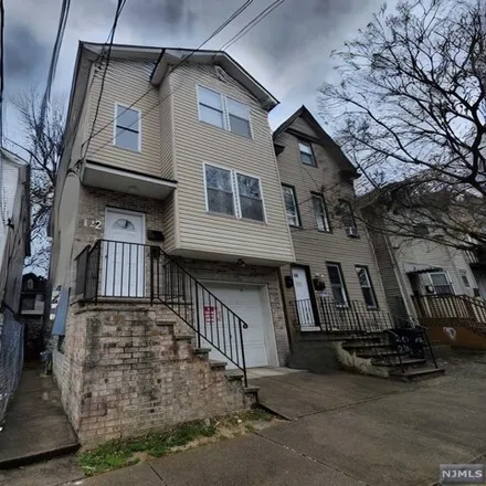 Buy this 4 bed house on 120 12th Avenue in Paterson, NJ 07501