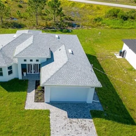 Buy this 4 bed house on 3209 29th St W in Lehigh Acres, Florida