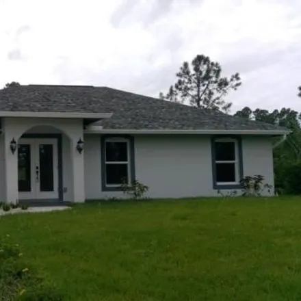 Rent this 3 bed house on 2911 22nd Street West in Lehigh Acres, FL 33971