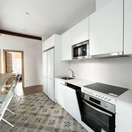 Rent this 8 bed apartment on Panadería La Gallega in Calle del Espinar, 28047 Madrid
