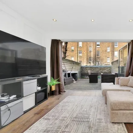 Rent this 3 bed townhouse on Carol Street in London, NW1 0AY