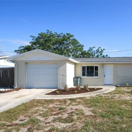 Buy this 3 bed house on 3525 Oxford Drive in Holiday, FL 34691