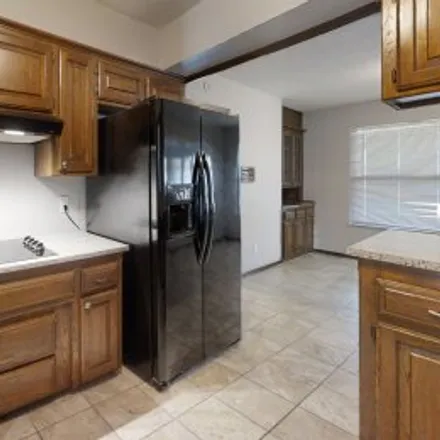 Rent this 4 bed apartment on 4009 Cherry Hill Lane in The Greens, Oklahoma City