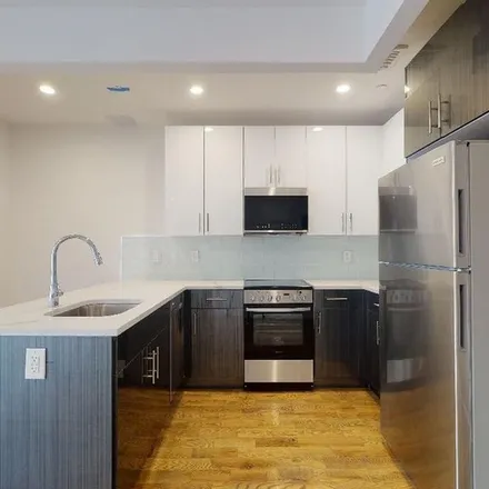 Rent this 2 bed apartment on 138-40 Queens Boulevard in New York, NY 11435