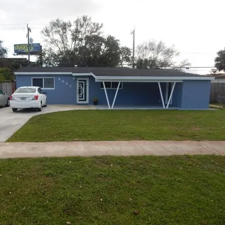 Buy this 3 bed house on 4092 Rochester Street in North Palm Beach, FL 33410