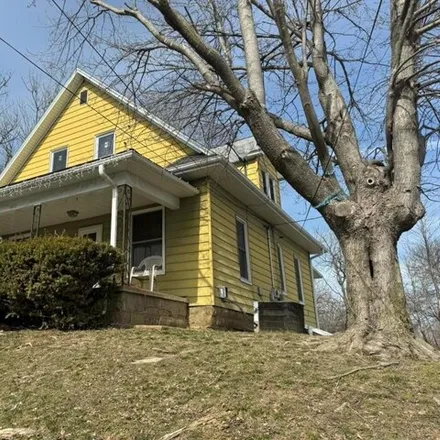 Buy this 3 bed house on Walnut Street in Milan, MO 63556