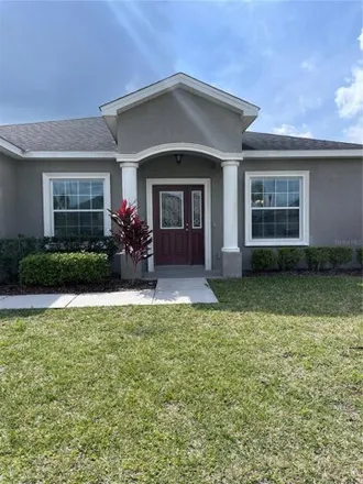 Rent this 4 bed house on 2615 Highlands Creek Way in Polk County, FL 33813