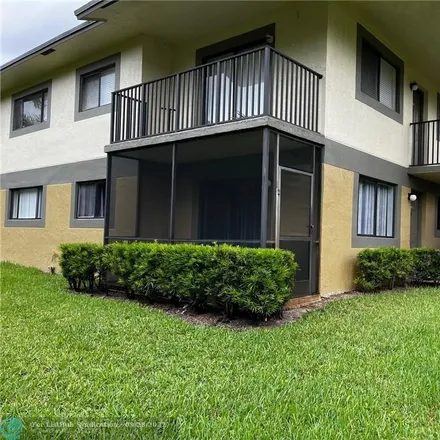 Buy this 2 bed condo on 545 Trace Circle in Arlington Park, Deerfield Beach