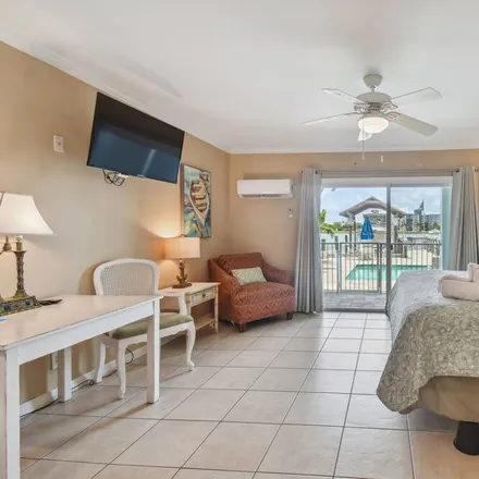 Rent this 7 bed apartment on Enchanted Inn & Beachside Cottages in 607 Bay Esplanade, Clearwater
