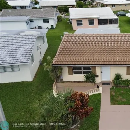 Buy this 2 bed house on 8503 Northwest 57th Court in Tamarac, FL 33321