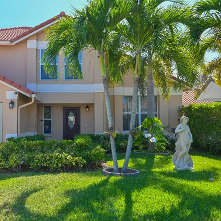 Rent this 4 bed house on 1994 Lake Breeze Court in Wellington, Palm Beach County