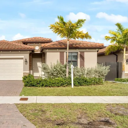 Rent this 4 bed house on 9090 Northwest 116th Street in Hialeah, FL 33018