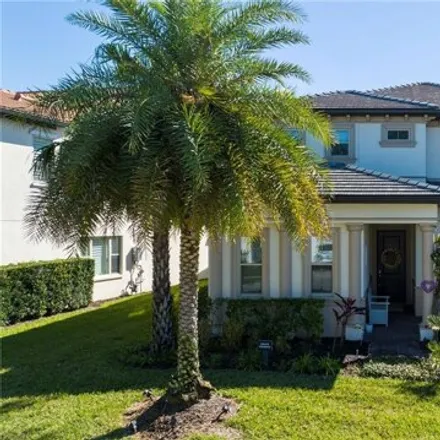 Buy this 5 bed house on 10429 Royal Cypress Way in Orange County, FL 32836