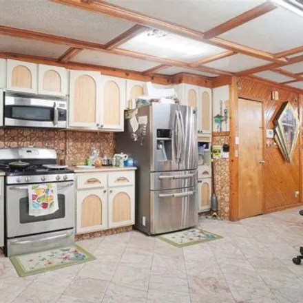 Image 4 - 181-16 93rd Avenue, New York, NY 11433, USA - House for sale