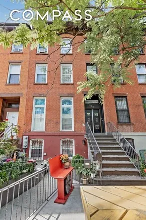 Buy this 8 bed townhouse on 300 Gates Ave in Brooklyn, New York