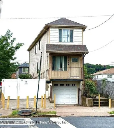 Buy this 4 bed house on 415 Narrows Road North in New York, NY 10304