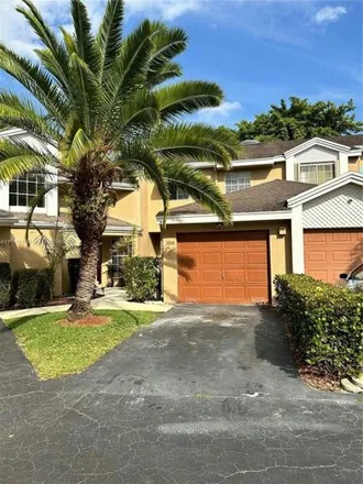 Buy this 3 bed house on Woodmont Country Club in 7801 Northwest 80th Avenue, Tamarac