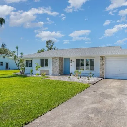 Buy this 3 bed house on 881 Riviera Drive Northeast in Palm Bay, FL 32905