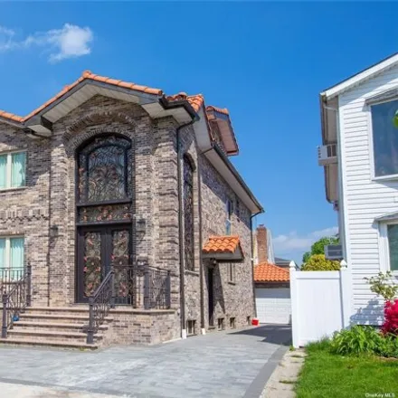 Buy this 6 bed house on 17-33 150th Street in New York, NY 11357