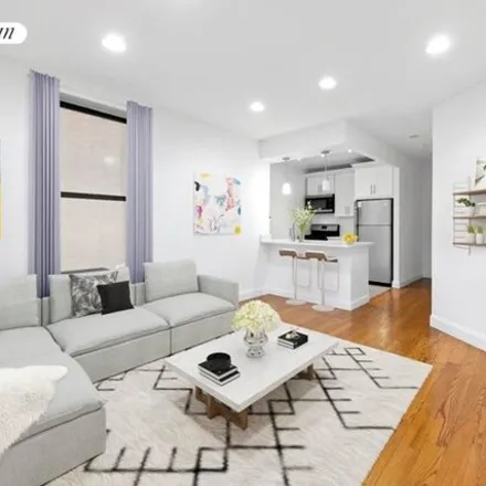 Rent this 3 bed apartment on 28 West 132nd Street in New York, NY 10037