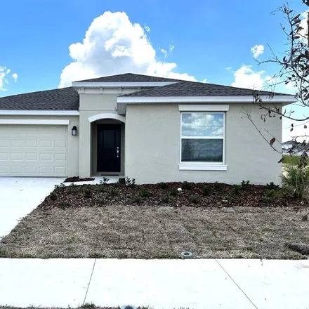 Rent this 4 bed house on Pigeon Plum Drive in Haines City, FL 33844
