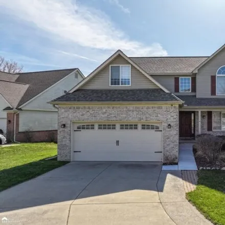 Buy this 4 bed house on 826 Maple Tree Drive in Fenton, MI 48430