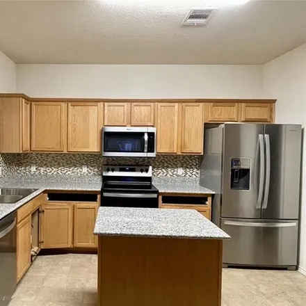 Rent this 3 bed house on 13504 Richard Nixon Street in Travis County, TX 78653