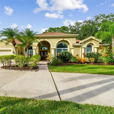 Buy this 5 bed house on 4075 Carlyle Lakes Boulevard in East Lake, FL 34685